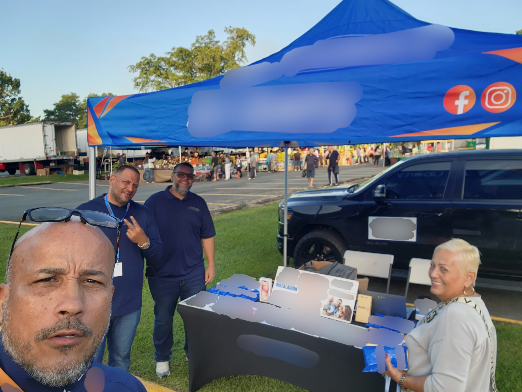 Express team at an outdoor Liberty community sales event